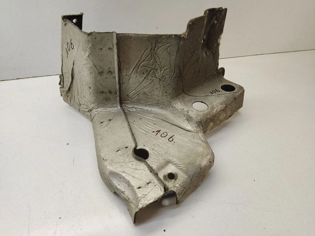 Exhaust heat shield – front