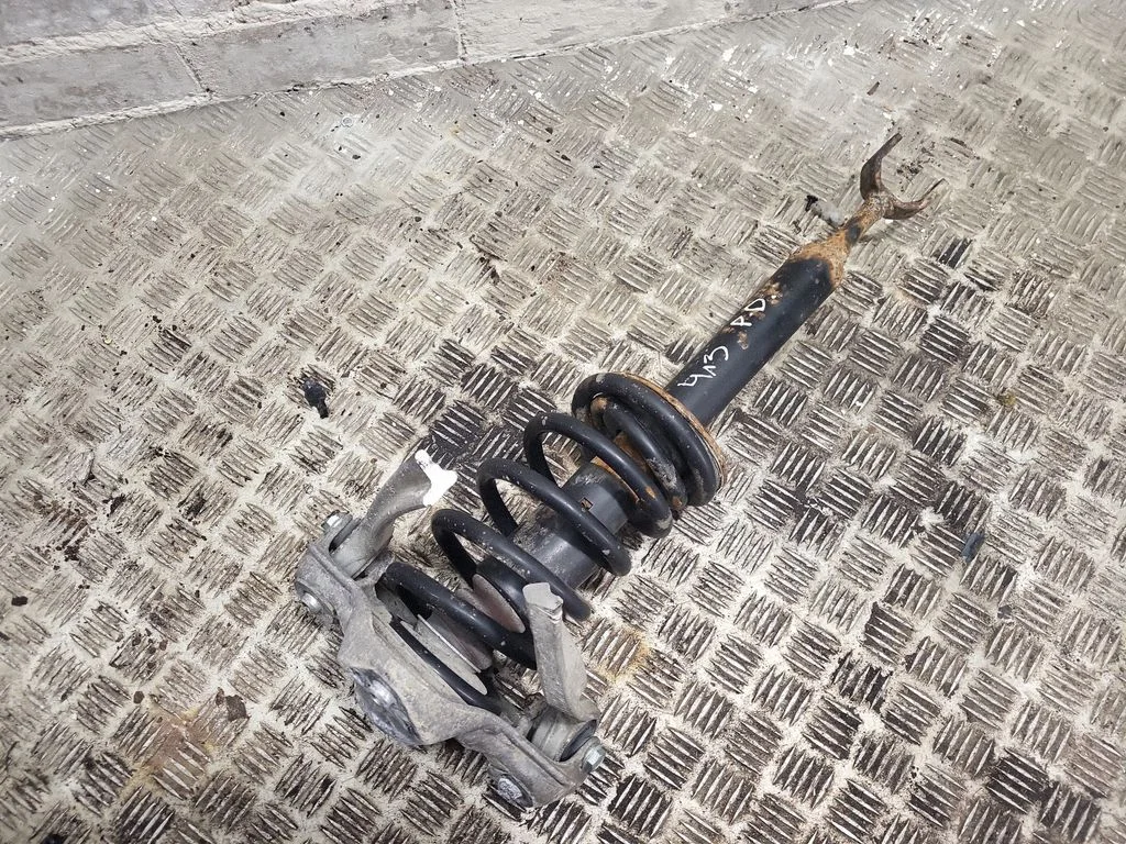 Front shock absorber with coil spring – Volkswagen Passat B5.5 (2001-2005)