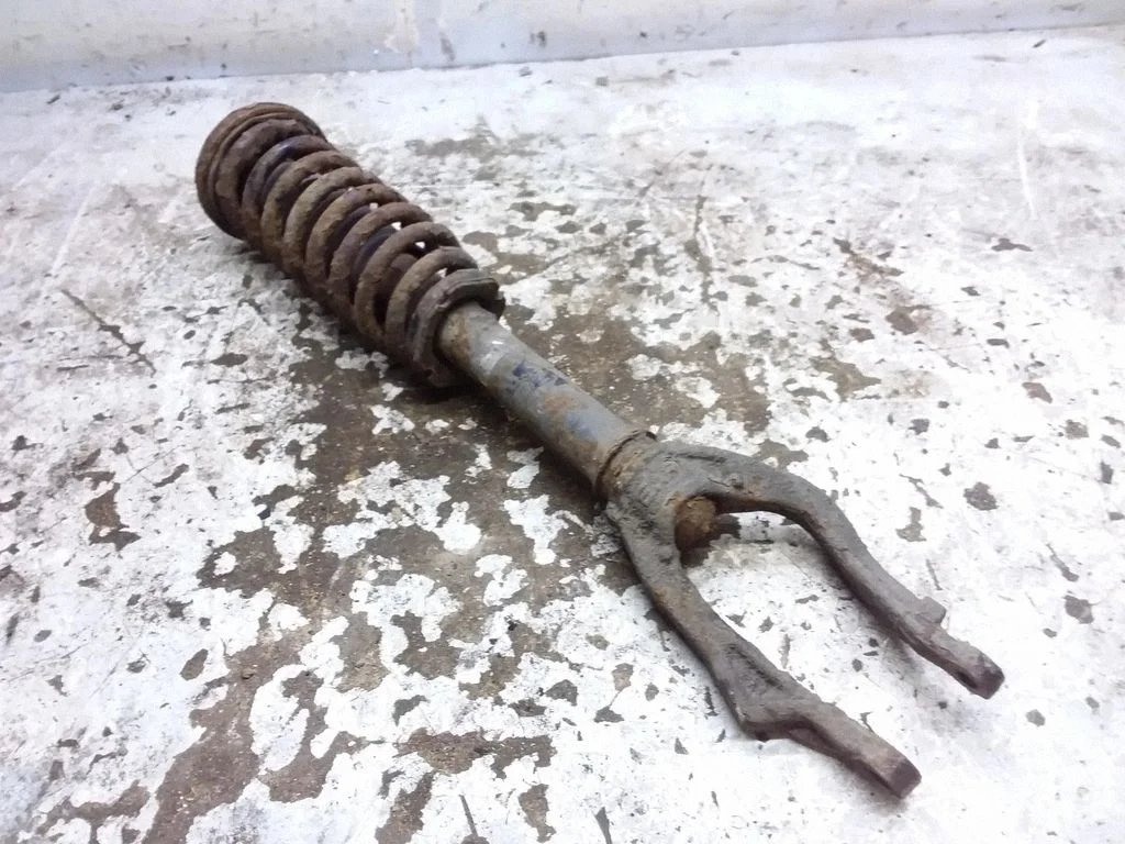 Front shock absorber with coil spring – front right