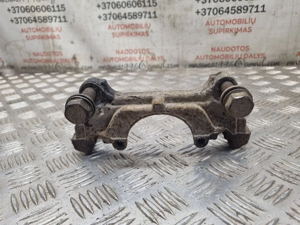 Front Brake Caliper Pad/Carrier – front left