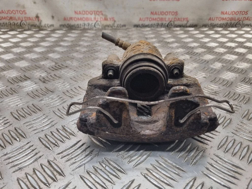 Front brake caliper – front left