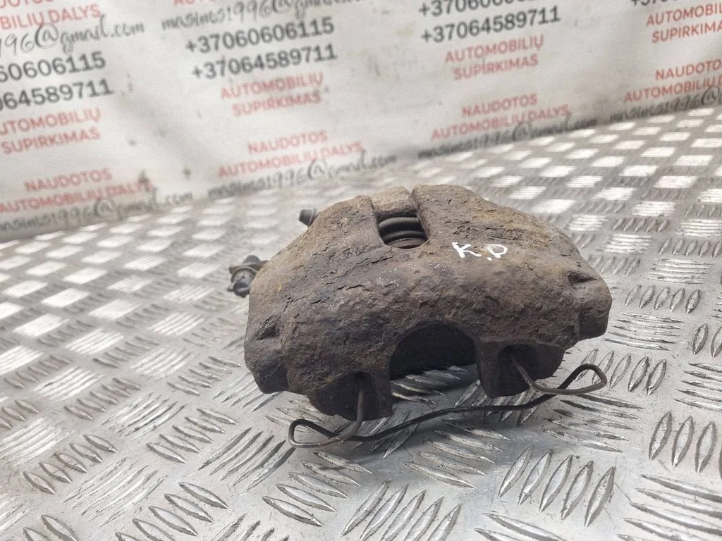 Front brake caliper – front left