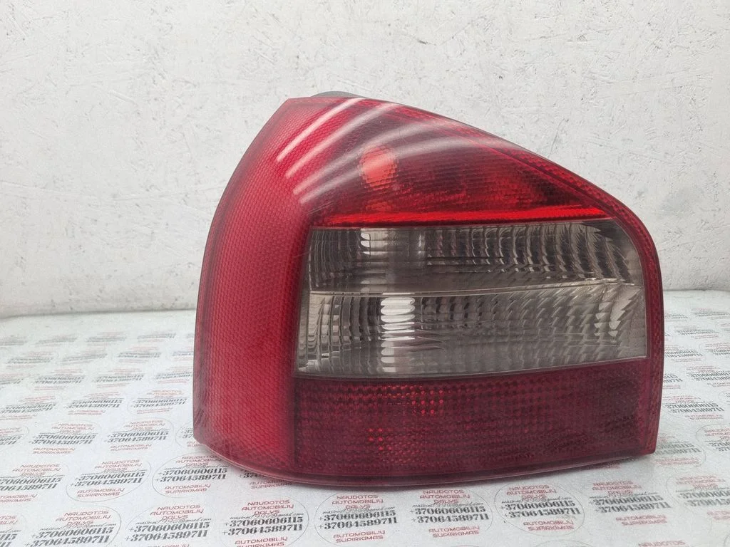 Tagatuli keres 8L0945095B