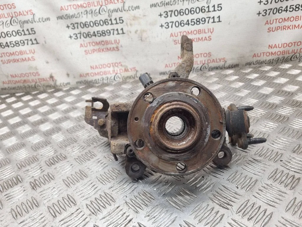 Front wheel hub spindle knuckle – front left