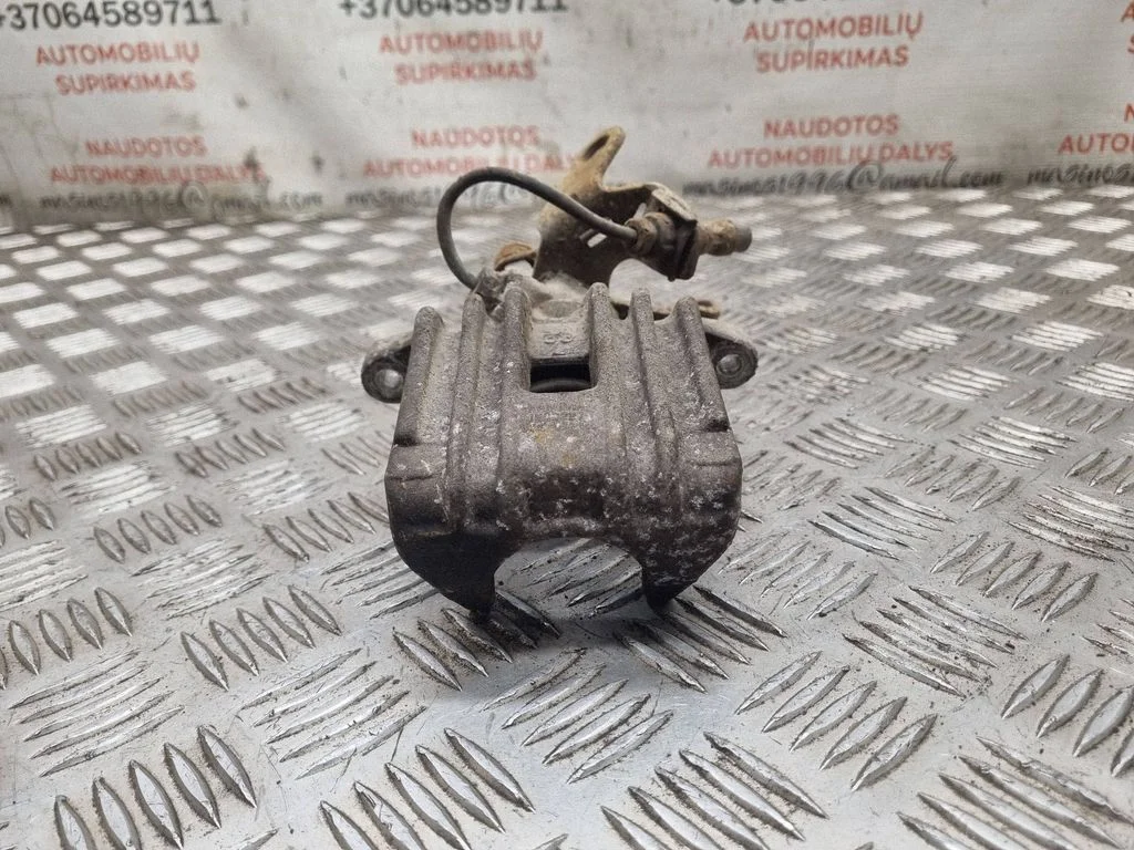 Rear brake caliper – rear left