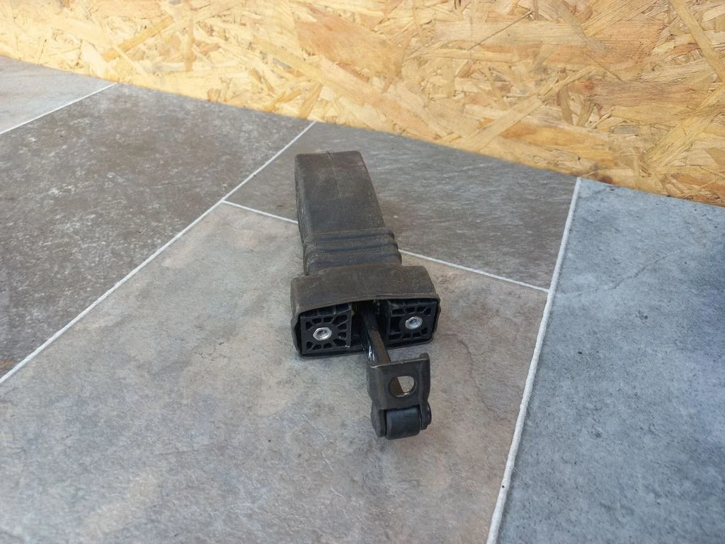 Rear door check strap stopper 8K0839249B