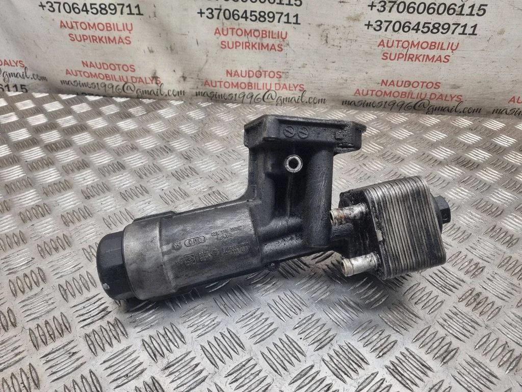 Oil filter mounting bracket 038115389C