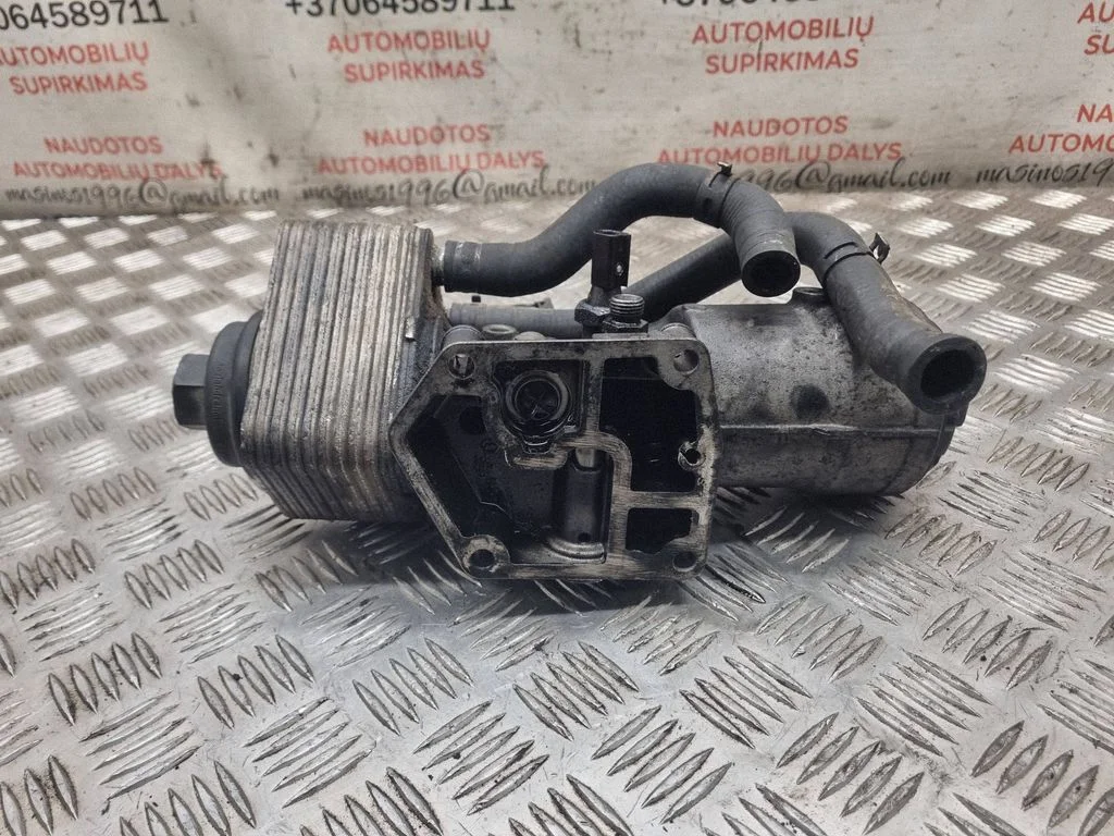 Oil filter mounting bracket – Volkswagen Touran I (2003-2010)
