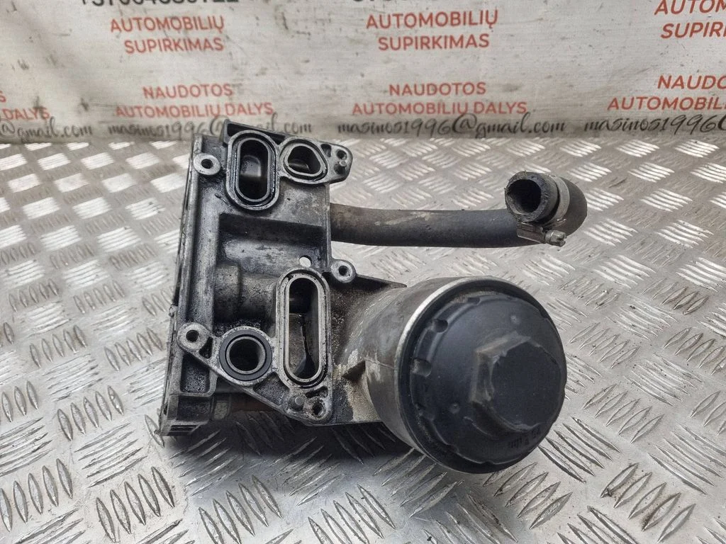 Oil filter mounting bracket – Volkswagen Touareg I (2002-2010)