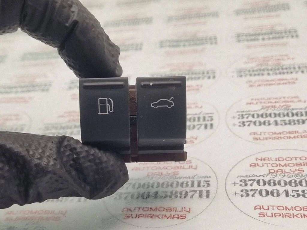 Fuel tank opening switch – Volkswagen Passat B6 (2005-2010)