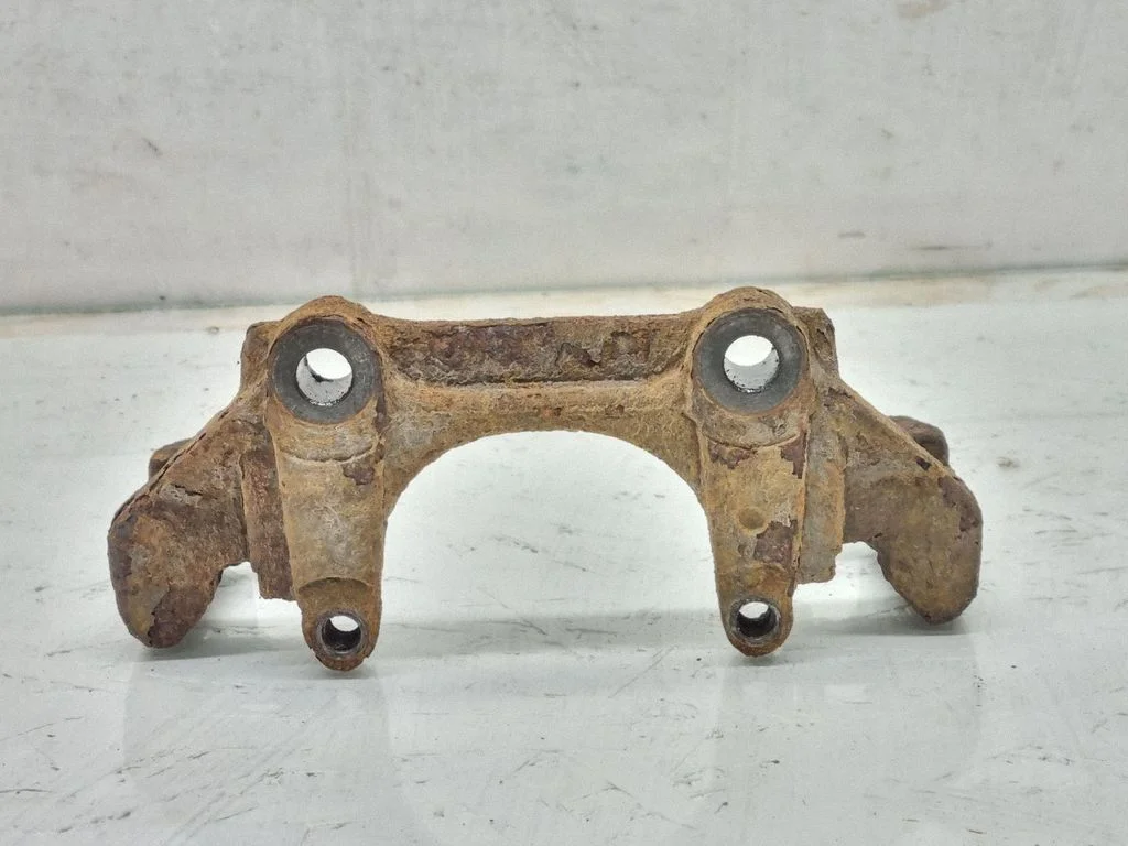 Front Brake Caliper Pad/Carrier – Volkswagen Passat B5.5 (2001-2005)
