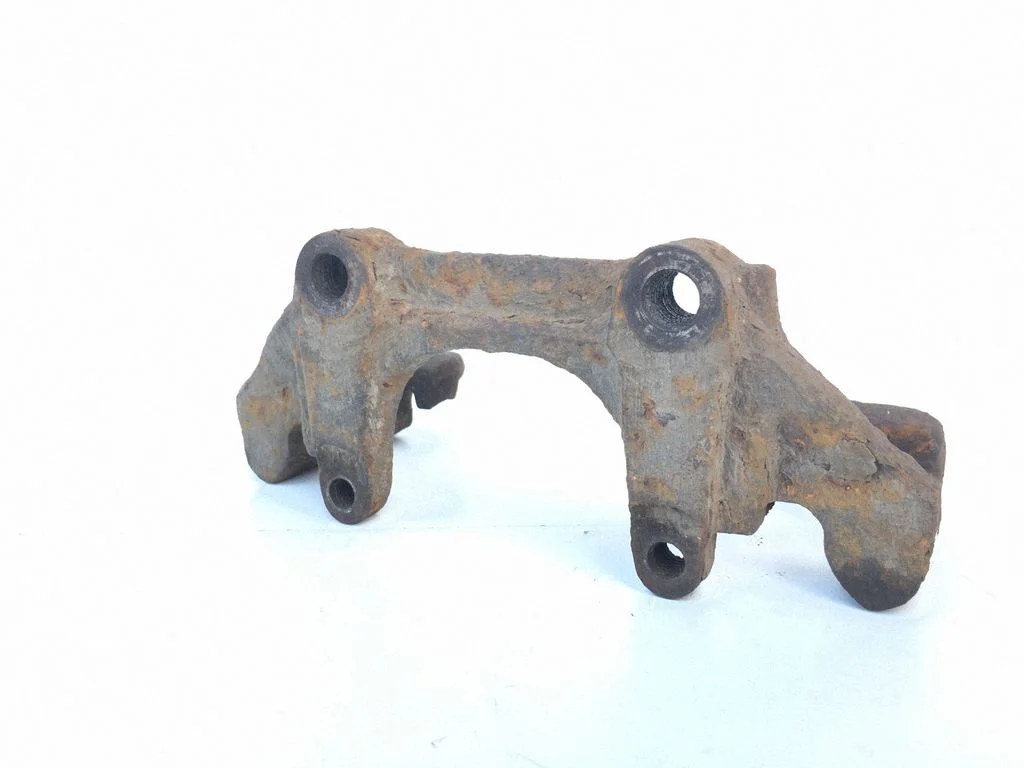 Front Brake Caliper Pad/Carrier – Volkswagen Passat B5 (1997-2000)