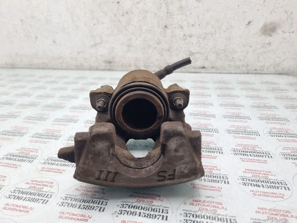 Front brake caliper – front right