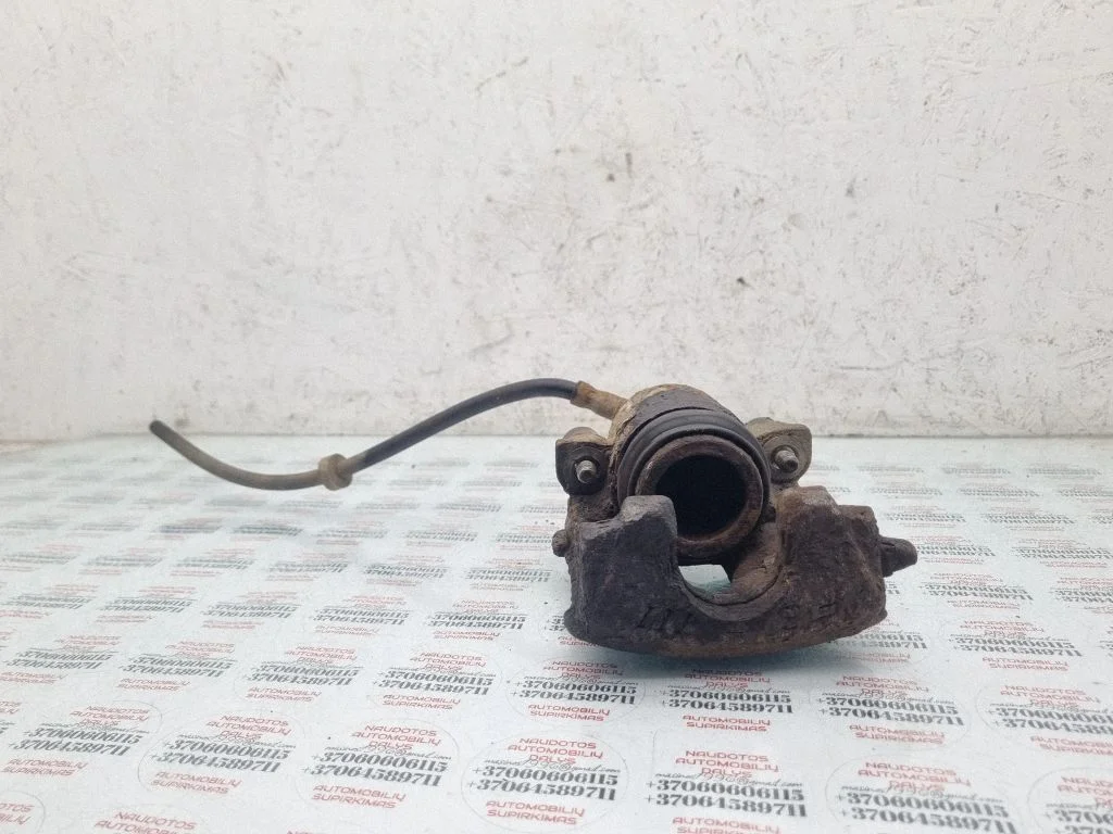 Front brake caliper – left