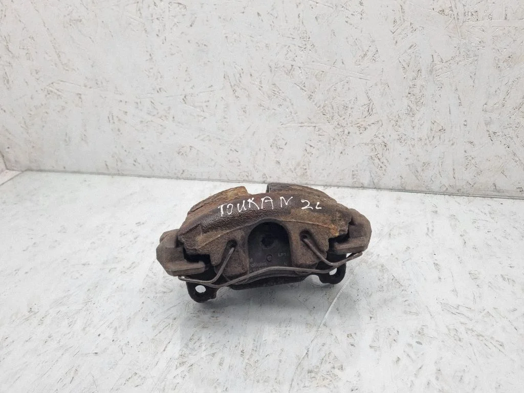 Front brake caliper – front right