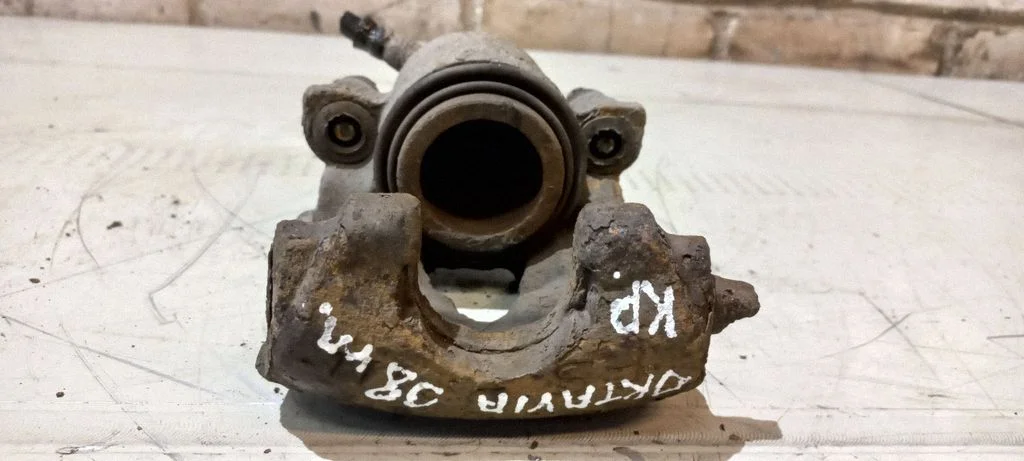 Front brake caliper – front left
