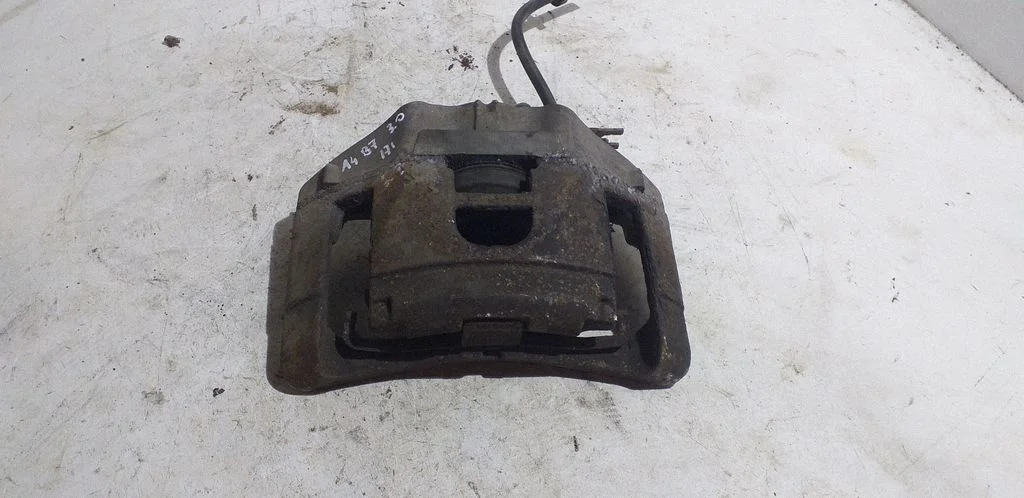 Front brake caliper – front right