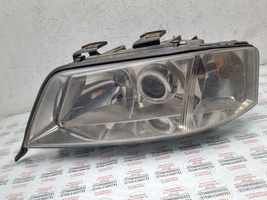 Headlight/headlamp – left