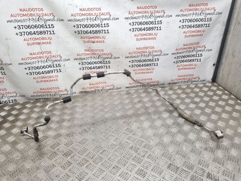Air conditioning (A/C) pipe/hose 1K0820741AD