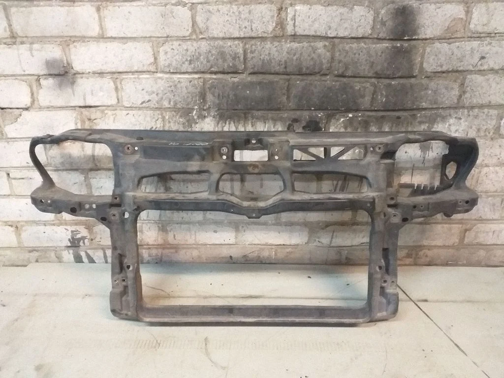 Radiator support slam panel