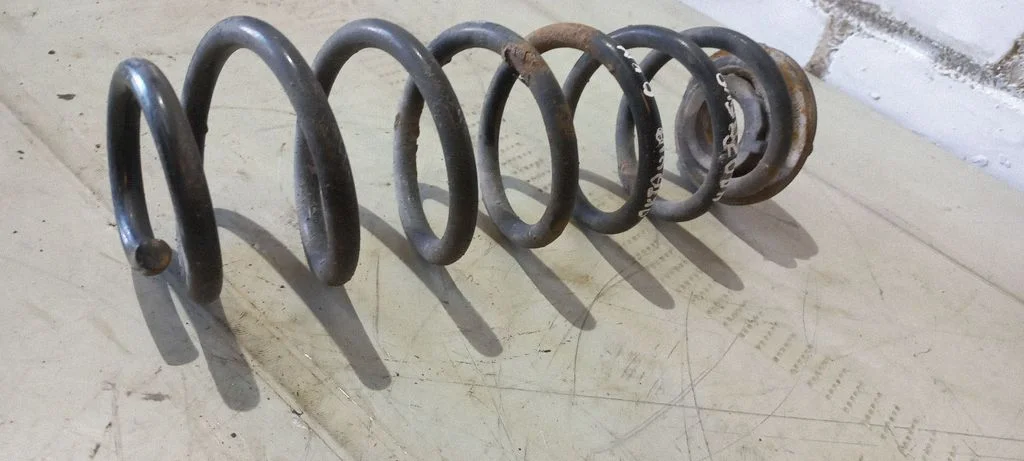 Rear coil spring – rear right