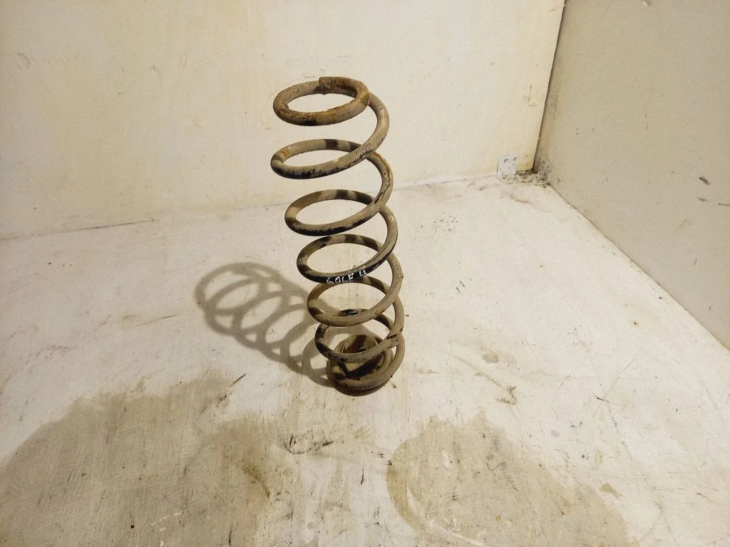 Rear coil spring – rear left
