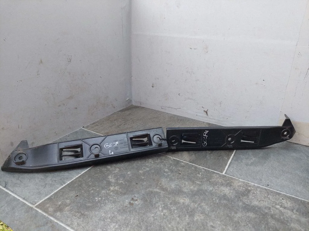 Front bumper mounting bracket 1J0807184A