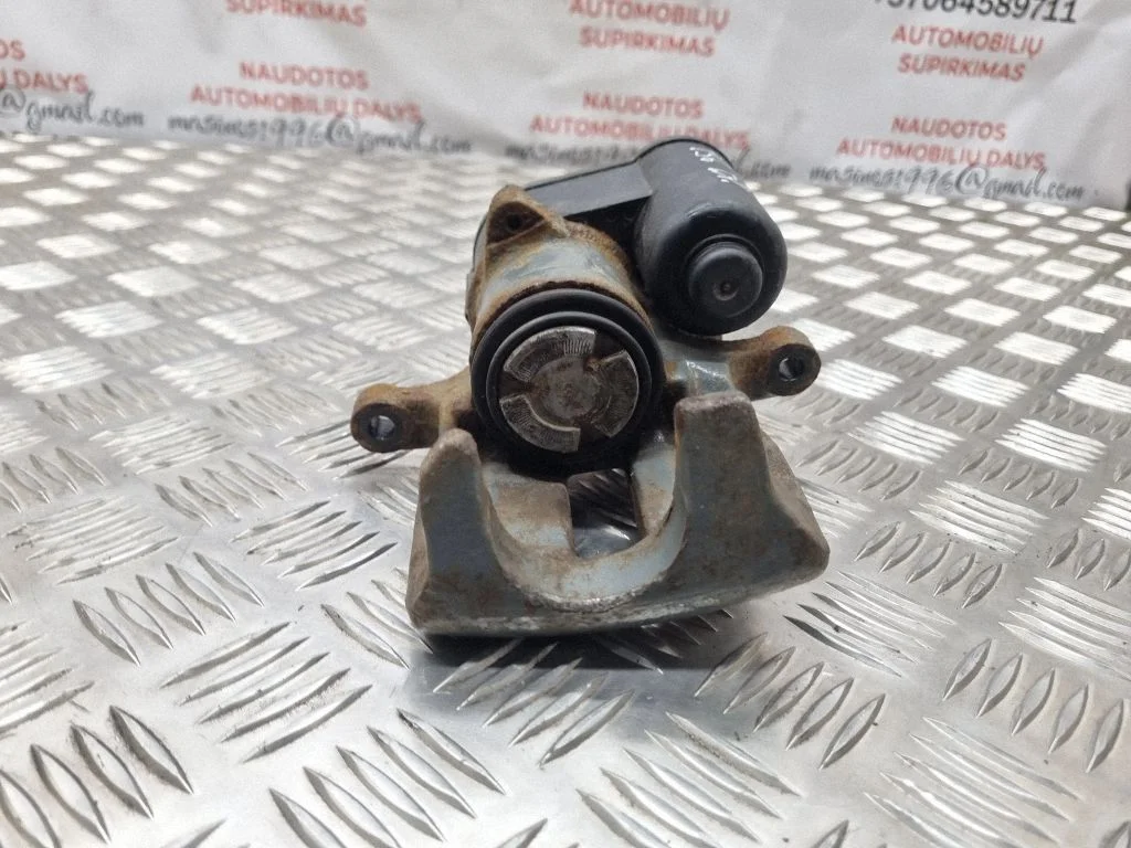 Rear brake caliper – right