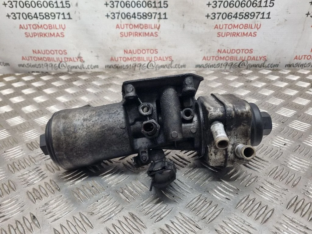 Oil filter mounting bracket – Volkswagen Touran I (2003-2010)