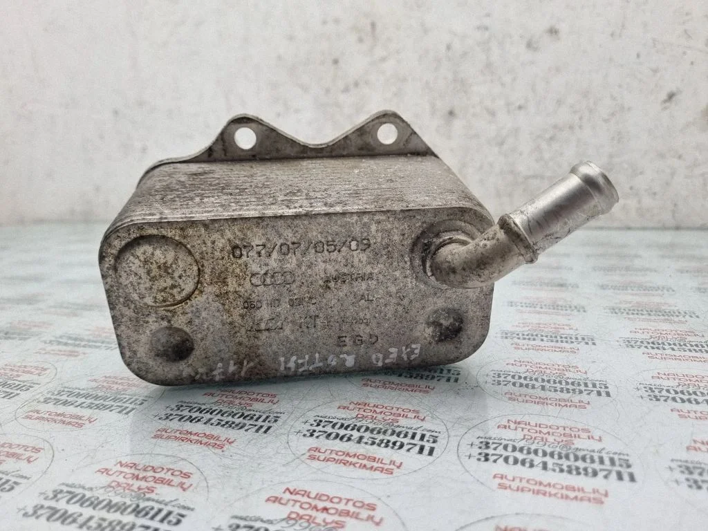 Oil filter mounting bracket 06D117021C