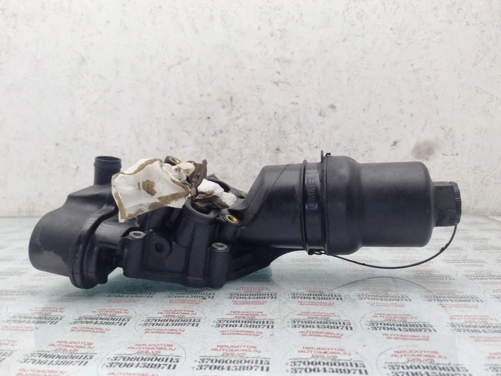 Oil filter mounting bracket 06F115397H