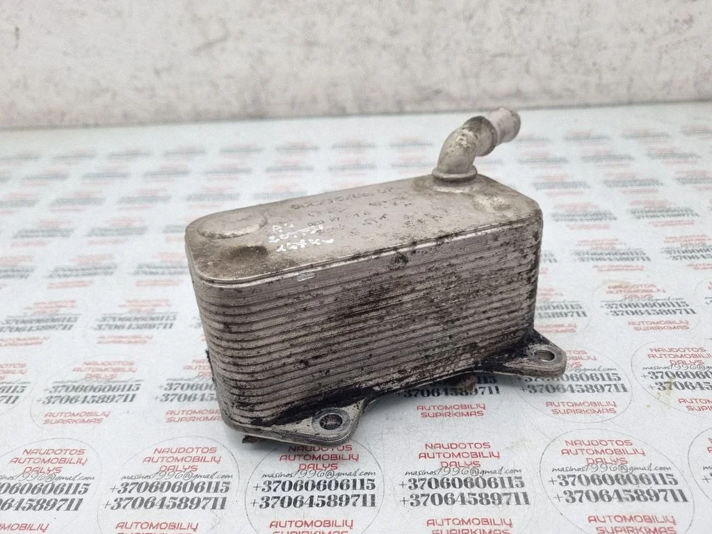 Oil filter mounting bracket 06D117021C
