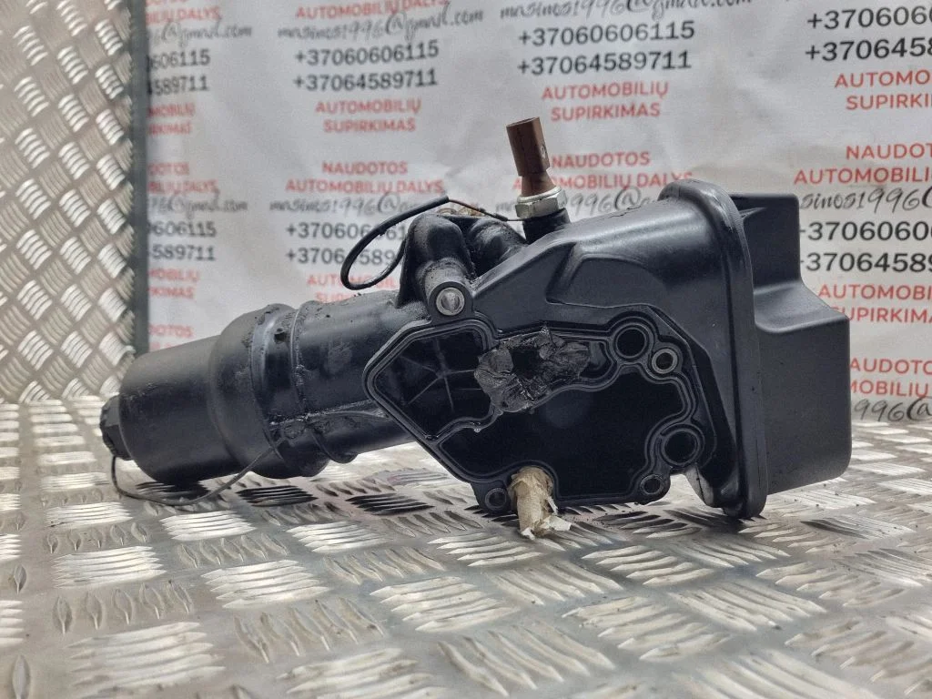 Oil filter mounting bracket 06F115397H