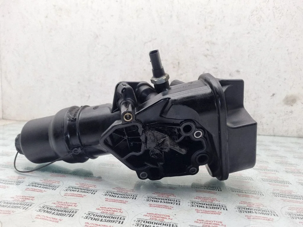 Oil filter mounting bracket 06F115397H