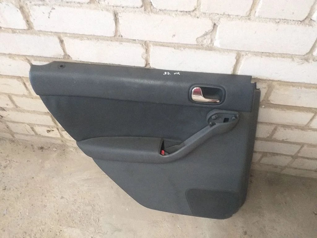 Rear door card panel trim – rear left