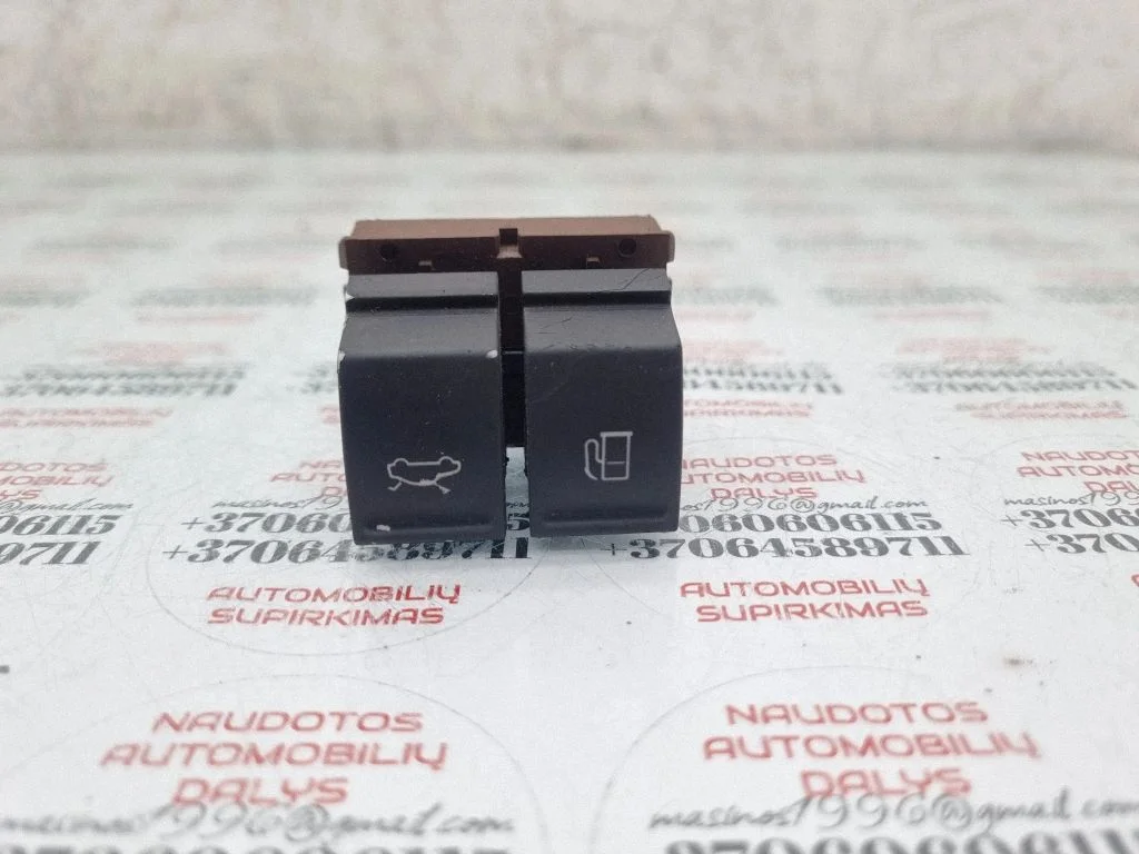 Fuel tank opening switch – Volkswagen Passat B6 (2005-2010)