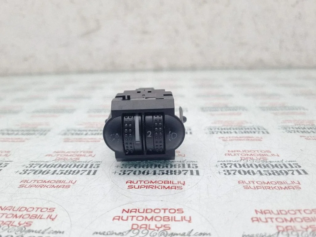 Headlight level height control switch – Volkswagen Passat B5.5 (2001-2005)