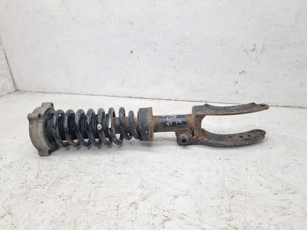 Front shock absorber with coil spring – Volkswagen Touareg I (2002-2010)