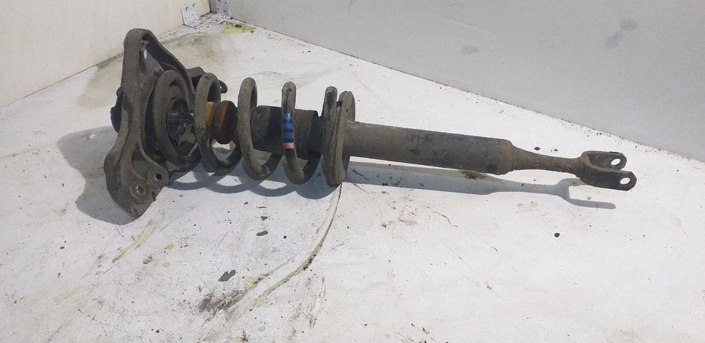 Front shock absorber with coil spring