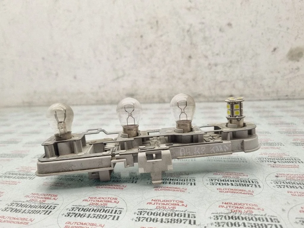 Tail light bulb cover holder 8D9945257