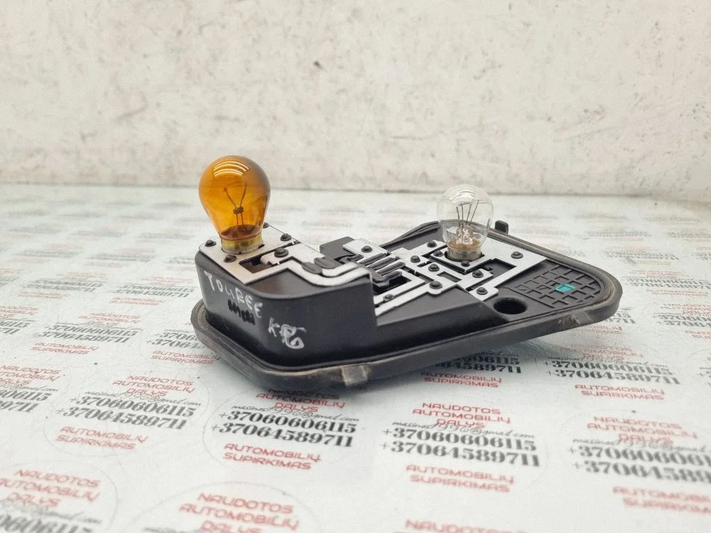 Tail light bulb cover holder – Volkswagen Touareg I (2002-2010)