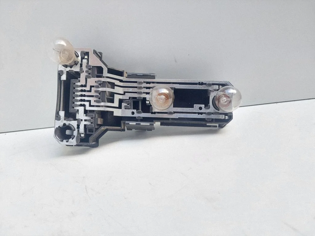Tail light bulb cover holder – Volkswagen Passat B5 (1997-2000)