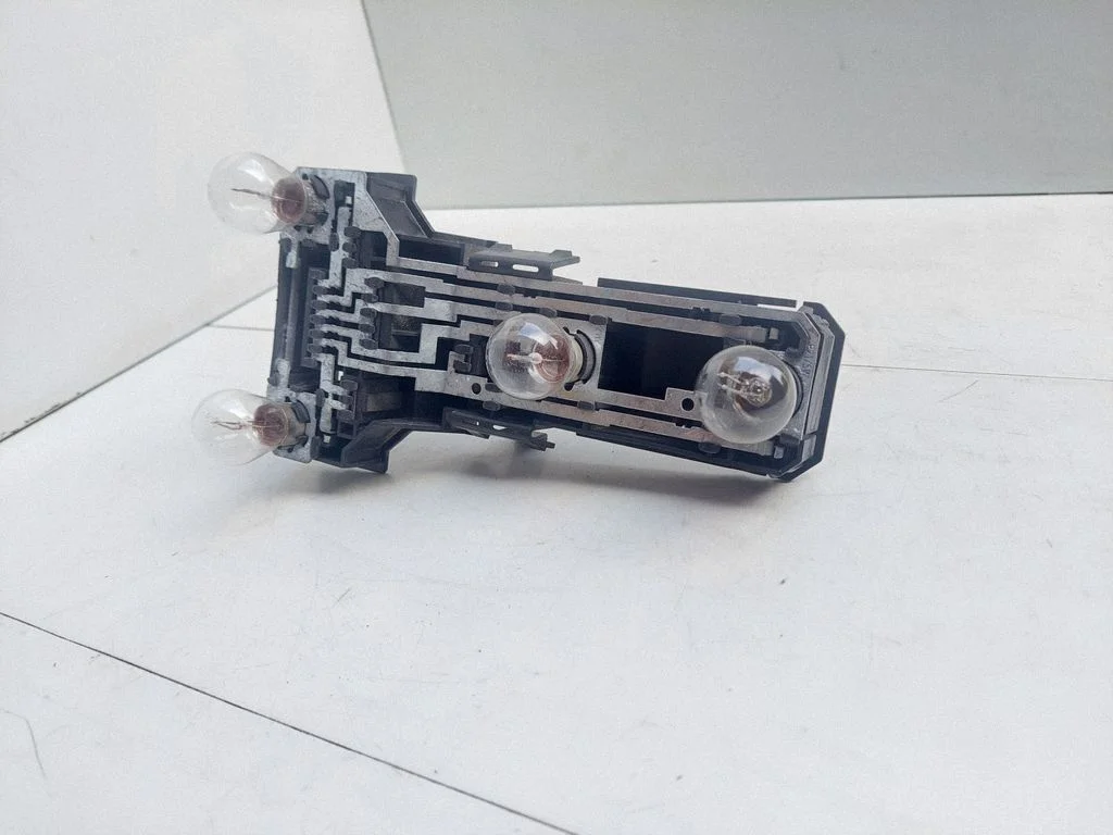 Tail light bulb cover holder – Volkswagen Passat B5 (1997-2000)