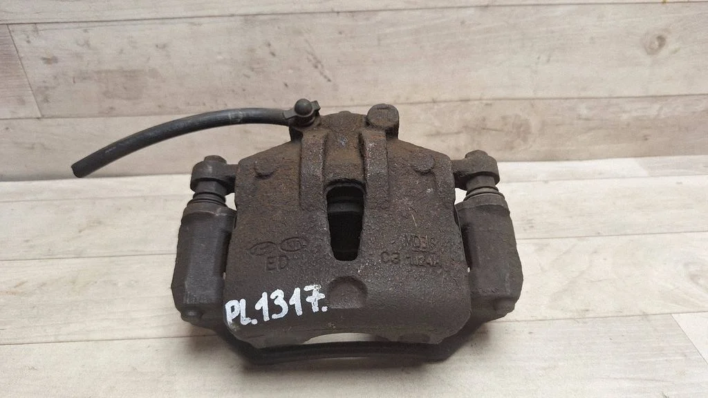 Front brake caliper – front left