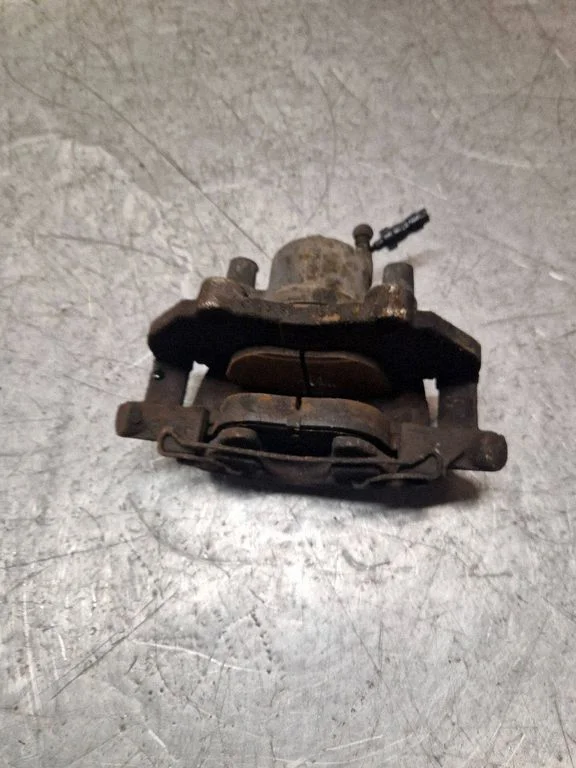 Front brake caliper – right