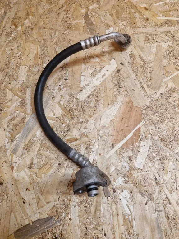 Air conditioning (A/C) pipe/hose 05058540AB