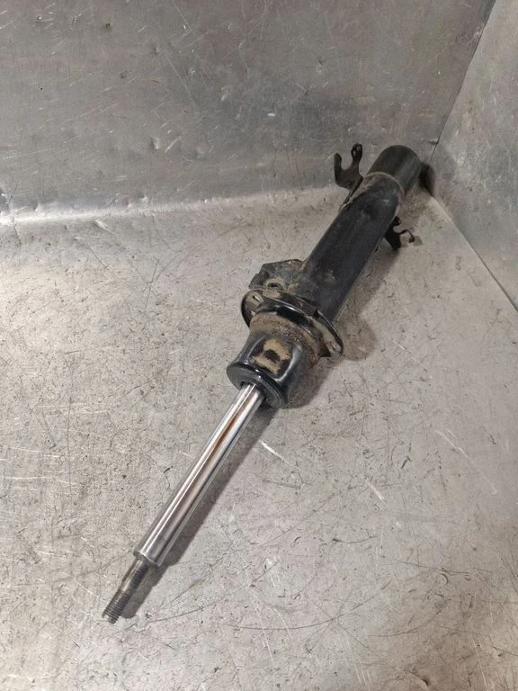 Front shock absorber/damper – left