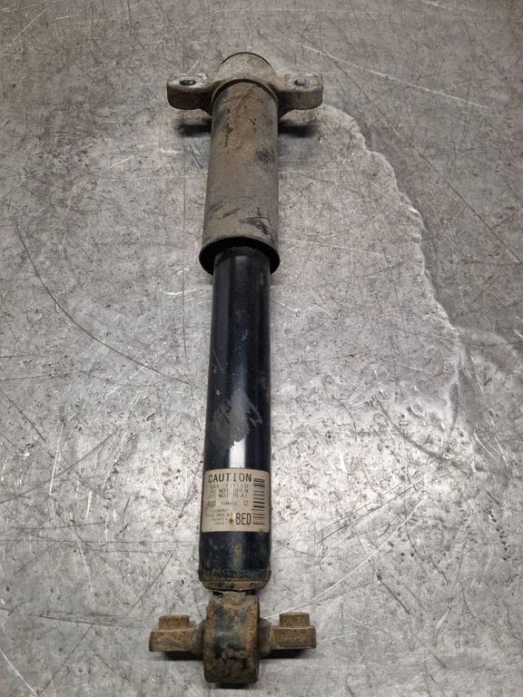 Rear shock absorber/damper F1GC18W002