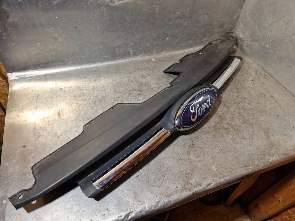 Front bumper upper radiator grill BK218A133A