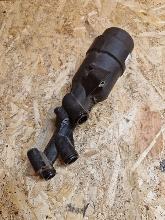 Oil filter mounting bracket 70321178